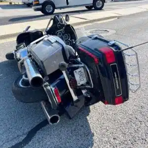 47-year-old Jeremy W. Whited was traveling in an eastbound lane on West Broad Street Monday morning on a 2012 Harley Davidson motorcycle as 65-year-old Eddie D. McGuire was in the other eastbound lane operating a 2008 John Deere Tractor. As McGuire was changing lanes, his tractor was hit by the motorcycle in the left rear tire. After impact the motorcycle skidded into the westbound lanes before coming to a final rest. (Jim Beshearse Photo)