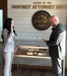 Criminal Court Judge Gary McKenzie swore in Jenna Huff Friday as an Assistant District Attorney in the district that includes Putnam, Overton, Clay, Pickett, DeKalb, White and Cumberland Counties.