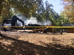 Investigators have found remains of a second body today only hours after the first body was discovered amid the ruins of a two-story log home in the River Watch Community of DeKalb County which caught fire and burned to the ground early this morning.