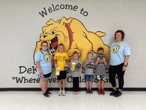 DeKalb West School turned one of the annual fundraisers—“Run for the Dogs” —into an opportunity to bring awareness to bullying prevention. Pictured left to right are PTO Officer Erica Garrett, winners Billy Clar, Avayeh Cook, Emma Sharp, and Rusty Chapman and PTO President Shelly Barnes. Not pictured: Sydney Turner and Anderson Sliger.