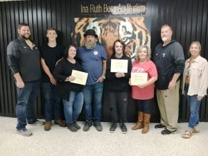 DeKalb County High School Friday recognized its teacher, student, and parent of the month for September. Pictured left to right: DCHS Assistant Principal Thomas Cagle; Shon Tucker, a Junior at DCHS who wrote a winning “Parents of the Month” essay for his mom and dad shown here with him Karie and Daniel Tucker; DCHS Senior and Student of the Month Lucian Mcjunkins; DCHS Cosmetology educator and Teacher of the Month Katherine Blaylock; DCHS Principal Bruce Curtis; and DCHS Assistant Principal Jenny Norris.