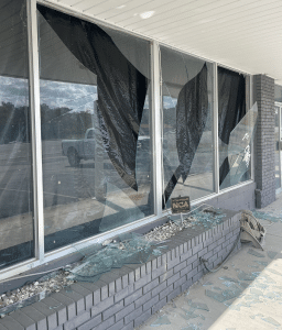 Broken windows at business on Highway 70 in Liberty from blasting pressure wave