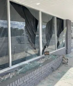 Broken windows at business on Highway 70 in Liberty from blasting pressure wave