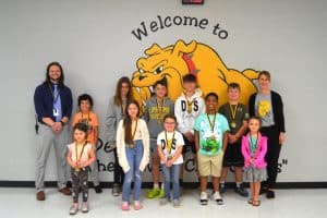 DeKalb West School October Students of the month pictured front row left to right are Tenley Hamlet, Claire Cripps, Neyland Garrett, Malachi Nolan-Figgins, and Laikynn Sparks. Back row left to right are Assistant Principal Seth Willoughby, Jonah King, Zoe Webster, John Byrd, Levi Cripps, Holden Leiser, and Principal Sabrina Farler.