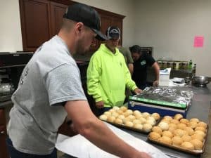 DESA Volunteers cooking for needy families on Thanksgiving