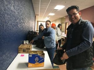 Caring volunteers helping feed their neighbors on Thanksgiving