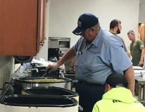 DESA Volunteers cooking meals to be delivered to needy families on Thanksgiving