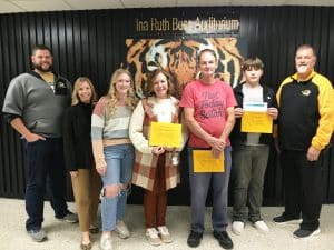 DeKalb County High School Tuesday recognized its staff member, students, and parent of the month for October. Pictured left to right: DCHS Assistant Principals Thomas Cagle and Jenny Norris, Freshman Lillie Grace Young who wrote a winning essay in tribute to her mother Crystal Gayle Young (standing next to her) as Parent of the Month, Staff Member of the Month Custodian Roy Goodwin, Co-Student of the Month Kason Nichols, and DCHS Principal Bruce Curtis. The other Co-Student of the Month Mallory Hollingsworth was absent