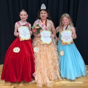 Charlee Mac Winfree (center), 8-year-old daughter of Ryan and Lindsy Winfree of Smithville was the winner of the Fall Fest Pageant in the age 7-10 category.. She was also awarded for prettiest hair and attire and she received the people’s choice optional award. First runner-up was Maddie Moore (left), 9-year-old daughter of Andrew and Alli Moore of Smithville. Second runner-up was Stella Grace Adcock (right), 9 year old daughter of Byron and Paige Adcock of Smithville. Adcock was also awarded for prettiest smile and eyes..