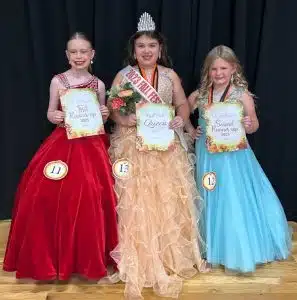 Charlee Mac Winfree (center), 8-year-old daughter of Ryan and Lindsy Winfree of Smithville was the winner of the Fall Fest Pageant in the age 7-10 category.. She was also awarded for prettiest hair and attire and she received the people’s choice optional award. First runner-up was Maddie Moore (left), 9-year-old daughter of Andrew and Alli Moore of Smithville. Second runner-up was Stella Grace Adcock (right), 9 year old daughter of Byron and Paige Adcock of Smithville. Adcock was also awarded for prettiest smile and eyes..