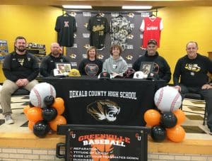 DCHS Tiger Senior Baseball Athlete Konner Young Signed with Greenville University Friday, December 8. Pictured left to right are DCHS Assistant Baseball Coach Daniel Leslie, Tiger Head Coach Tad Webb, Kim Young (mom), Konner Young, Jeremy Young (dad), and DCHS Assistant Coach Dave Parker
