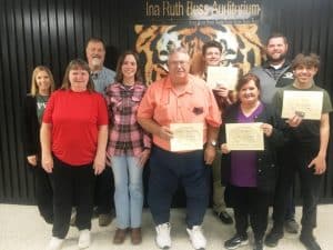 DeKalb County High School Tuesday recognized its staff member, students, and parents of the month for November. Pictured left to right front row are Parents of the month Tonya Youngblood and Wade Youngblood with their daughter Christina between them, Staff member of the Month Cafeteria Manager Kathy Chapman and Co-Student of the Month Eli Redmon. Back row left to right- DCHS Assistant Principal Jenny Norris, Principal Bruce Curtis, Co-Student of the Month Jamison Bare, and DCHS Assistant Principal Thomas Cagle