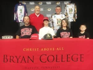 Bryan College, known for its award winning fishing teams, has landed a big catch from DeKalb County High School. Senior Jaxon Humphrey (seated between his parents) signed a letter of intent Friday , December 15 to further his education career at Bryan in Dayton, Tennessee on a fishing scholarship after he graduates in May from DCHS. It is the first ever fishing scholarship awarded to a DCHS student. Jaxon was accompanied at the signing by his parents (seated next to Jaxon) J.D. and Cathleen and brother Cainnan Humphrey along with: Standing left to right Bryan College Fishing Coach Mike Keen and DCHS Fishing Coach Jeff Taylor