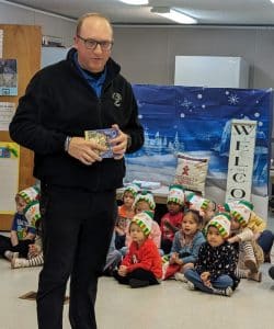 Ryan Huling of the New Life United Pentecostal Church shared the Christmas story with Head Start children (Shawna Willingham photo)