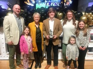 2023 DCHS Junior Football standout Ty Webb was announced Saturday night as the winner of the Coach Clay Edwards Memorial Tiger Pride Award. Members of Edwards’ family presented the award to Webb including pictured left to right: Clay’s son Abram Edwards, Abram’s daughter Emmie, Abram’s mother Tena Edwards-Jacobs , Ty Webb, Abram’s wife, Shannon and Abram’s daughters Carleigh Clay Edwards, and Harmony Edwards.