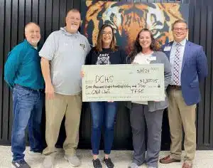 DCHS received a grant recently from The Foundation for Geriatric Education (TFGE) to support students enrolled in the Certified Nursing Aide course at NHC Smithville during the spring semester. Pictured in the photo from left to right are CTE Director Brad Leach, Principal Bruce Curtis, Teacher Angie Johnson, Director of Nursing Lori Panter, and Administrator Ryan Vaden.