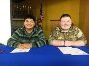 DCHS Seniors Eric Soto (left) and Kholton Melton sign with TCAT McMinnville in Welding