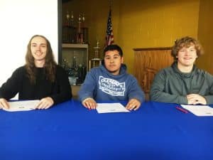 DCHS Seniors (left to right) Pacey Ballew, Brandon Palomo, and Westin Wright sign with TCAT McMinnville in RCIE Industrial Electricity