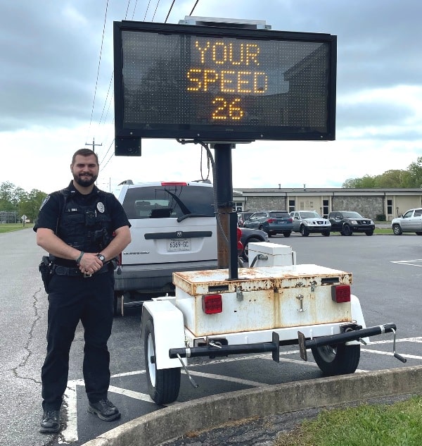 Watch your speed! The Smithville Police Department is beginning to utilize a Tennessee Safety Office radar and message board to combat speeding on city streets. “You will see this sign around the city periodically along with two of our own (signs) that are currently being assembled. Your police department is always looking for ways to make our city safer,” said Police Chief Mark Collins. Pictured here is the Smithville Police Department’s THSO Officer Lane Ball with THSO’s message board.