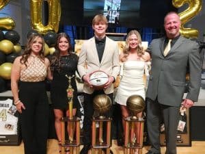Seniors Conner Close and Ella VanVranken were named the DCHS Tiger and Lady Tiger basketball Most Valuable Players at the annual team banquet, while Senior Elaina Turner is the Most Valuable Cheerleader. The awards were sponsored by Love-Cantrell Funeral Home and presented by Chad and Shelia Kirby. The MVP and MVC awards are named in memory of Kirby’s grandfather Allen D. Hooper. Pictured left to right: Shelia Kirby, Elaina Turner, Conner Close, Ella VanVranken, and Chad Kirby