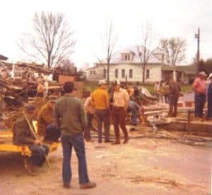 Townspeople surveying the damage after the Dowelltown tornado 50 years ago