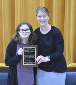 Principal Sabrina Farler presents the Mrs. Sabrina Farler Principal's Award to Jaiden Tramel for most yearly Accelerated Reader points. She earned 519.1.