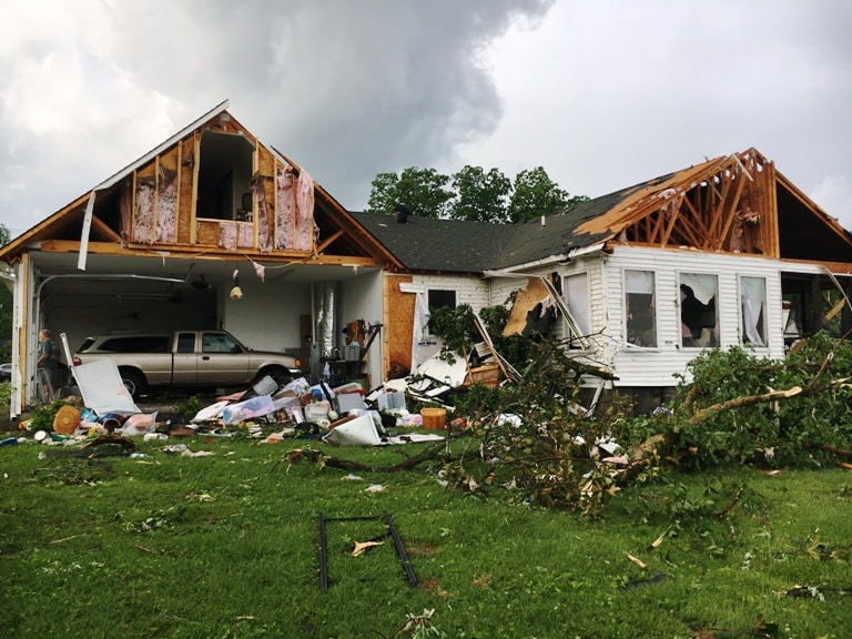 Tornado damage at rear of Joe and Polly Payne home on North Congress Boulevard