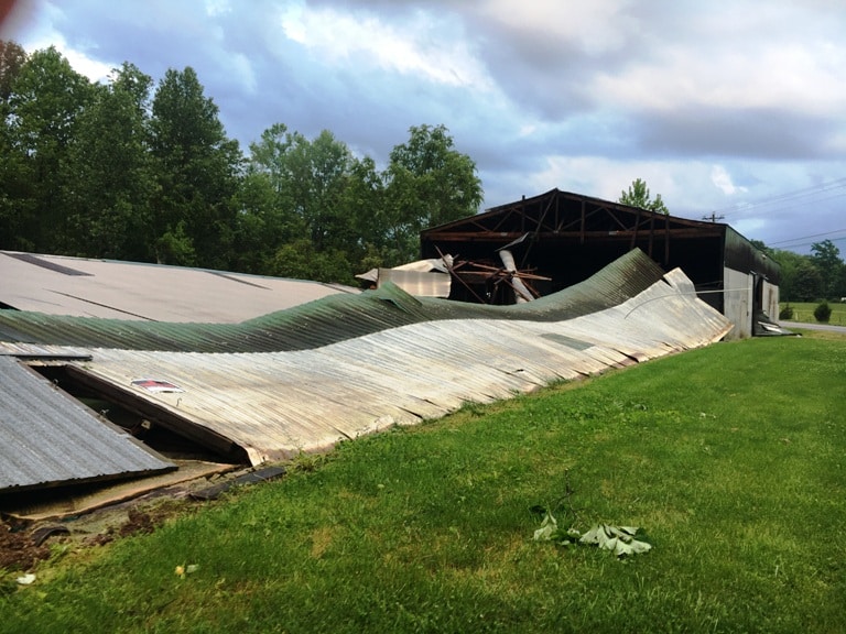 Tornado blows down portion of warehouse building on Allen's Ferry Road
