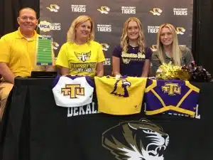 Talented DCHS Football Cheerleader Allyson Fuller Signs with Tennessee Tech. Pictured are Ally’s father and mother, Anthony and Amanda Fuller along with Ally and Sydney Hickerson, Tech’s head coach of cheer and dance