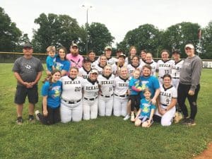 Athletes and coaches of the DCHS Tigerette Softball Program paused for a photo Monday evening with the Brandon Cox family in support of their daughter, 5 year old Carrigan who was recently diagnosed with leukemia. Carrigan threw out the first pitch of the Tigerette’s Region Tournament game in Smithville against Marshall County