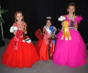 DeKalb Fair Little Miss Pageant: Pictured left to right: First runner-up Eloise Hendrix of Dowelltown, the 5-year-old daughter of Jared and Jennifer Hendrix; Little Miss Jazmin Perez of Smithville, the 4-year-old daughter of Joel Perez and Blanca Jones; and Second Runner-up Rozlyn Marie Prichard, 6-year-old daughter of Mark and Amanda Prichard of Smithville.