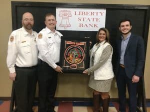 Lieutenant Andrew Harvey is the Liberty State Bank DeKalb Fire Department Officer of the Year for 2024. The award was presented by Rhonda Caplinger and Noah Roberts of Liberty State Bank and DCFD Assistant Chief Anthony Boyd.