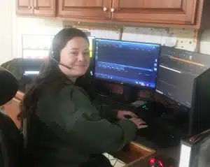 DeKalb Emergency Communications (E-911) dispatcher Bailey Redmon