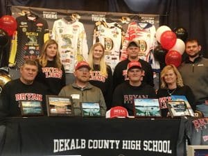 DCHS Senior Mason Taylor Signs with Bryan College on a Fishing Scholarship. Pictured seated left to right: DCHS Fishing Coach and Mason’s father Jeff Taylor, Bryan Coach Dustin Henderson, Mason Taylor, and Mason’s mother Kim Taylor. Standing left to right: Sisters Elicia Puckett and Olivia Taylor, brother Casey Taylor, and brother-in-law Johnathon Puckett.
