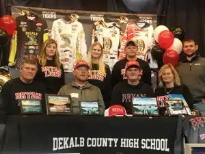 DCHS Senior Mason Taylor Signs with Bryan College on a Fishing Scholarship. Pictured seated left to right: DCHS Fishing Coach and Mason’s father Jeff Taylor, Bryan Coach Dustin Henderson, Mason Taylor, and Mason’s mother Kim Taylor. Standing left to right: Sisters Elicia Puckett and Olivia Taylor, brother Casey Taylor, and brother-in-law Johnathon Puckett.