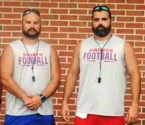 Stepping down and stepping up! After eight years including two undefeated conference championship seasons, DeKalb Saints head football coach Justin Poteete (right) is stepping down this fall but his brother Hunter (left) will be stepping up to succeed him as leader of the middle school program.