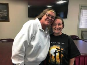 Alexandria Mayor Beth Tripp congratulates Ambre Ahlgard on being hired as a part time water clerk by the Aldermen Monday night, April 7