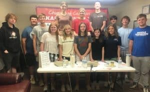 Members of DCHS Class of 2025 Project Graduation Radiothon participants pictured left to right: Javan Walker, Luke Midgett, Seth Fuson, Avery Agee, Katherine Knowles, Caroline Crook, Emily Robinson, Madeline Martin, Caleb Gray, Hannah Keith, Annabella Dakas, Ian Barnes, Jackson Mathis, and Kobe Roller