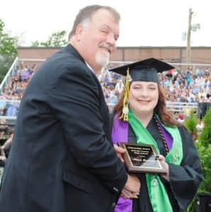 DCHS Principal Bruce Curtis presents Citizenship Award to Alissa Summers during Class of 2025 Graduation Friday night