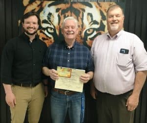 Longtime DCHS Carpentry Teacher Gary Caplinger Gets Teacher of the Month Award for April. Pictured here with Assistant DCHS Principal Seth Willoughby (left) and DCHS Principal Bruce Curtis (right).