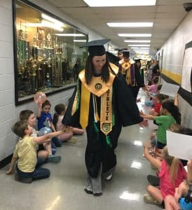 DCHS Class of 2025 Salutatorian and Class President Madeline Martin and her fellow seniors greeted students at both DeKalb West School and Smithville Elementary School during a “Senior Walk” Thursday. Martin shown here at DeKalb West School