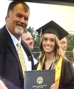 Emily Tate Young pictured here with DCHS Principal Bruce Curtis was one of 171 graduates who received diplomas during Friday night’s commencement program for the Class of 2025