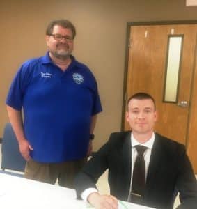 County Mayor Matt Adcock signs proclamation observing May 18-24 as Emergency Medical Services Week in DeKalb County. DeKalb EMS Director Trent Phipps also pictured here