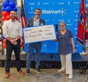 Smithville Walmart Donates $2,000 to Support Smithville Fiddlers’ Jamboree: Pictured from left to right: Grant James, Treasurer of the Jamboree, Steve Able, Walmart Store #4414 Store Manager and Kim Driver Luton, President of the Jamboree