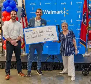 Smithville Walmart Donates $2,000 to Support Smithville Fiddlers’ Jamboree: Pictured from left to right: Grant James, Treasurer of the Jamboree, Steve Able, Walmart Store #4414 Store Manager and Kim Driver Luton, President of the Jamboree