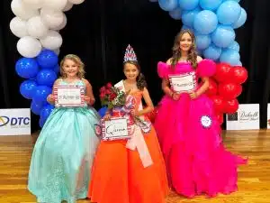 Cortlynn Joins (center) was crowned the 2025 Miss Jamboree Queen in the age 10-12 category Saturday. Serenity Rayne Foster (left) was 1st runner-up. Second runner-up went to MaKaeleigh Tarpley (right).