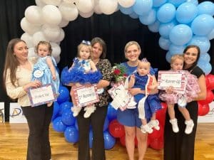 Miss Jamboree Pageant Winners in the girls 13-24 months category: Queen Ettalyn Val Rankhorn (2nd from right) 13 month old daughter of Jacob and Ashlee Rankhorn of Rock Island. She also won for Prettiest Smile and Most Photogenic. First runner-up Katlyn Gibbs (2nd from left) 18 month old daughter of Jana Gibbs of Sparta, 20 month old Lemon Grace Dalton (far right) was 2nd runner-up. She is the daughter of Fletcher and Liz Dalton of Sparta. Her optional awards were for Prettiest Eyes, Attire, and Peoples Choice. Stella Seifert (far left) 21 month old daughter of Sierra Silver and Colton Seifert of Smithville, won for Prettiest Hair.