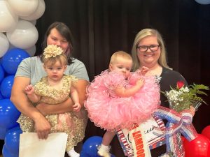 Miss Jamboree Pageant Winners in the girls 7-12 months category: Queen Charlotte Cay Koelle (right) 12 month old daughter of Heather and Christian Koelle of Smithville. She also won for Prettiest Attire, Smile, and Most Photogenic. First runner-up went to Stella Clouse (left) 10 month old daughter of Drake and Amanda Clouse of Smithville. Her optional award was for Prettiest Eyes.