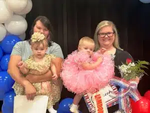 Miss Jamboree Pageant Winners in the girls 7-12 months category: Queen Charlotte Cay Koelle (right) 12 month old daughter of Heather and Christian Koelle of Smithville. She also won for Prettiest Attire, Smile, and Most Photogenic. First runner-up went to Stella Clouse (left) 10 month old daughter of Drake and Amanda Clouse of Smithville. Her optional award was for Prettiest Eyes.