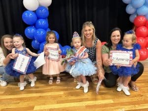 Miss Jamboree Pageant Winners in the girls 25 to 48 months category: Queen Indy Williams (2nd from right) 28 month old daughter of Brian and Stephanie Williams of Smithville. She also won for Prettiest Attire, Most Photogenic, and Peoples Choice. First runner-up Enleigh Brooke Phillips (2nd from left) 40 month old daughter of Kyle and MaKenzi Phillips of Dowelltown. Her optional award was for Prettiest Hair. Jacee Martin was second runner-up (far right). She is 2-year-old daughter of Ashley and Gaven of Dowelltown. Corie Rae Smith (far left) 28 month old daughter of Jesse and Chloe Smith of Smithville received optional awards for Prettiest Eyes and Smile.